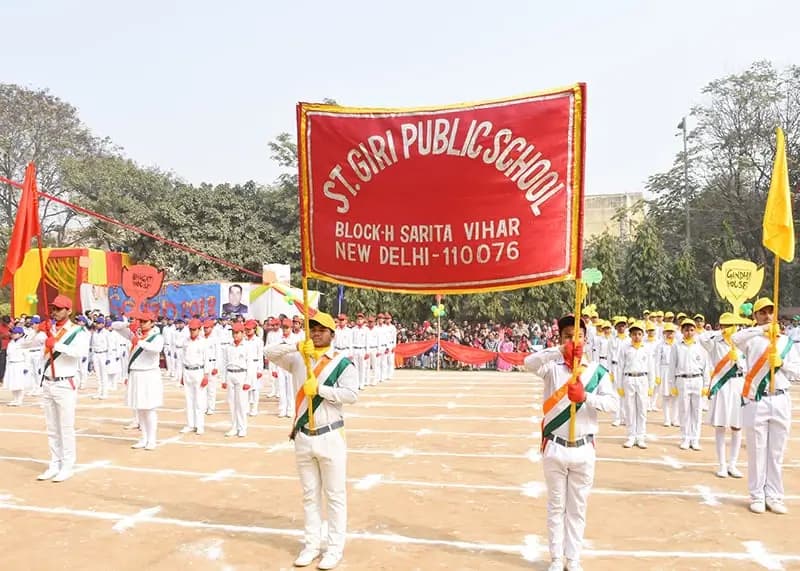Marching band and house flags at the Srijan annual day parade